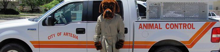 Person in Officer McGruff Costume in Front of Animal Control Truck