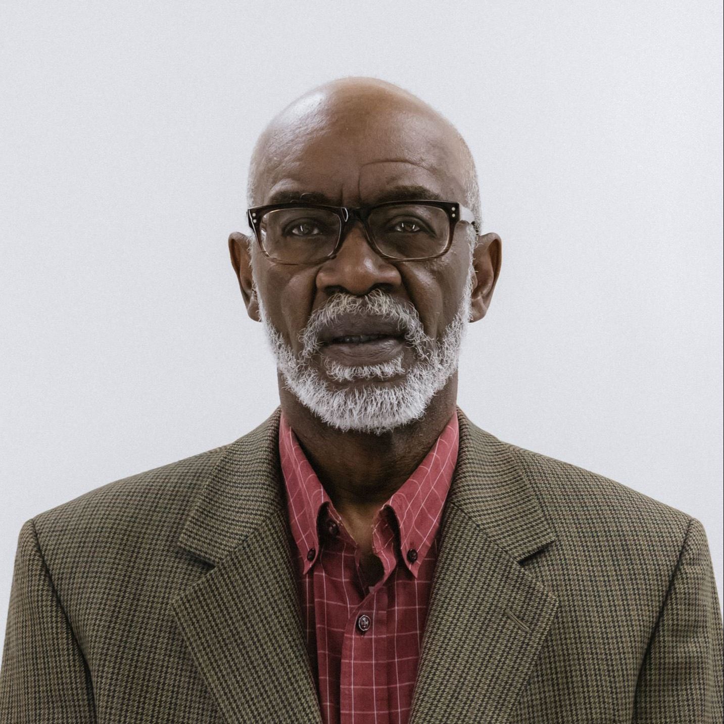 Councilor George Mullen photographed in front of white background